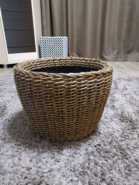 Уход и эксплуатация кашпо из ротанга
